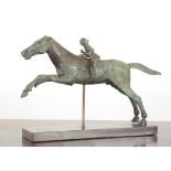 AFTER THE ANTIQUE, A BRONZE FIGURE OF THE JOCKEY OF ARTEMISION