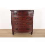 A GEORGE IV MAHOGANY BOW FRONT TALL CHEST