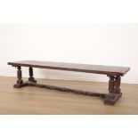 A VICTORIAN OAK BENCH