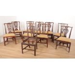 A MATCHED SET OF TEN MAHOGANY DINING CHAIRS