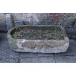 A LARGE STONE TROUGH