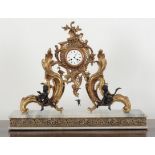 A LARGE FRENCH GILT METAL MANTEL CLOCK