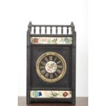 AN AESTHETIC SLATE AND PORCELAIN MOUNTED KEYLESS MOVEMENT MANTEL CLOCK BY ETIENNE MAXANT