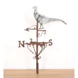 A WROUGHT IRON WEATHER VANE