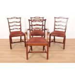 A GROUP OF FOUR GEORGE III STYLE MAHOGANY DINING CHAIRS