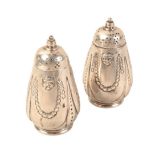 A PAIR OF GEORGE III SILVER PEPPERETTES