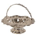 AN EARLY VICTORIAN SILVER CAKE BASKET
