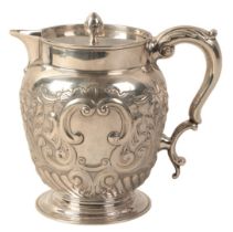 A LATE VICTORIAN SILVER MILK JUG