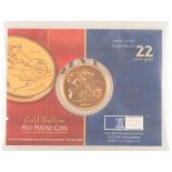 A 2000 QUEEN ELIZABETH II MILLENIUM £5 GOLD COIN