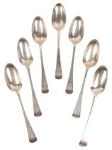 A SET OF SEVEN GEORGE III IRISH SILVER OLD ENGLISH PATTERN TABLE SPOONS