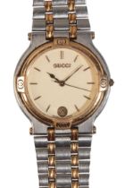 GUCCI: A GENTLEMAN'S GOLD-PLATED & STAINLESS STEEL BRACELET WATCH