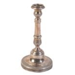 A 19TH CENTURY CONTINENTAL WHITE METAL MINIATURE CANDLESTICK