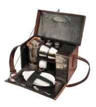 AN EDWARDIAN LEATHER PICNIC SET