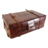 A VICTORIAN LEATHER AND BRASS-BOUND TRAVELLING TRUNK