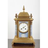 A GILT METAL AND JASPERWARE MOUNTED MANTEL CLOCK BY HOWELL, JAMES & CO.