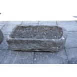 A LARGE STONE TROUGH