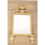 A GEORGE III STYLE CARVED GILTWOOD MIRROR