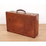 AN EDWARDIAN BROWN LEATHER CASE
