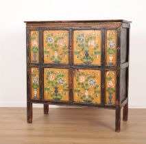 A TIBETAN PAINTED CABINET