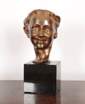 A FRENCH BRONZE HEAD OF YOUNG BOY