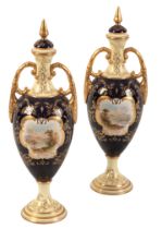 A PAIR OF COALPORT PORCELAIN SLENDER URNS AND COVERS