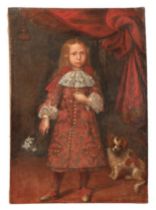 PIEDMONTESE SCHOOL, 17TH CENTURY (?) A child standing full-length in an interior with a spaniel to o
