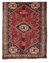 AN ANTIQUE QASHQUAI RUG