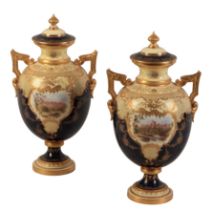 A PAIR OF COALPORT PORCELAIN URNS AND COVERS