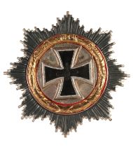 A 1957 GERMAN CROSS IN GOLD