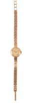 CERTINA: A LADY'S 9CT GOLD BRACELET WATCH