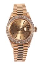 ROLEX OYSTER PERPETUAL DATEJUST: A LADY'S 18CT GOLD BRACELET WATCH