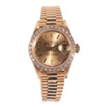 ROLEX OYSTER PERPETUAL DATEJUST: A LADY'S 18CT GOLD BRACELET WATCH
