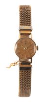 OMEGA: A LADY'S 9CT GOLD WRISTWATCH