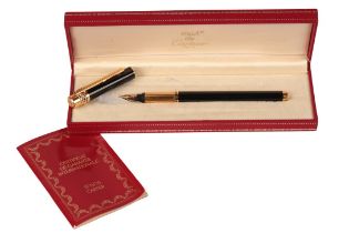 MUST DE CARTIER: A STYLO GOLD PLATED AND BLACK LACQUER FOUNTAIN PEN
