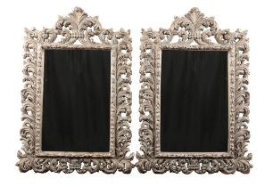 A PAIR OF ITALIAN BAROQUE STYLE SILVERED MIRRORS