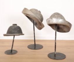 A GROUP OF THREE SPANISH 'HAT MAKER'S' MOULDS
