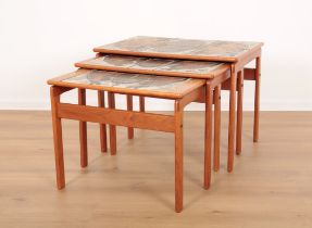 A NEST OF THREE TEAK TABLES