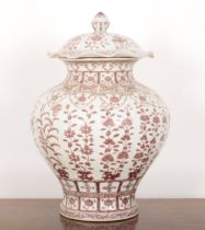A LARGE CHINESE COPPER RED VASE AND COVER