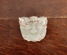 A CHINESE ARCHAISTIC CARVED JADE BELT BUCKLE