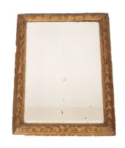 A CARVED GILTWOOD DRESSING MIRROR