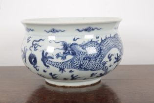 A CHINESE BLUE AND WHITE TRANSITIONAL STYLE 'DRAGON ' JARDNIERE