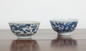A NEAR PAIR OF CHINESE BLUE AND WHITE PORCELAIN BOWLS