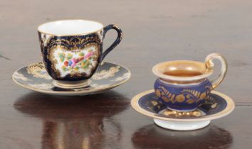 TWO CABINET CUPS AND SAUCERS