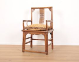 A CHINESE ELM OPEN ARMCHAIR