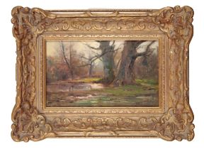 FREDERICK GOLDEN SHORT (1863-1936) A river landscape