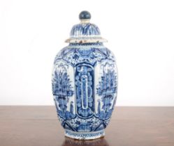 A DUTCH DELFT BLUE AND WHITE VASE AND COVER