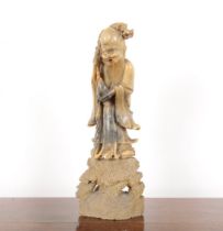 A CHINESE CARVED SOAPSTONE FIGURE OF SHOU LOA