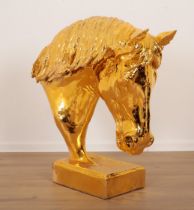 A LARGE GILDED PLASTER BUST OF A HORSE