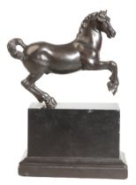A TUSCAN BRONZE OF A REARING HORSE