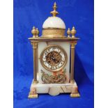 A FRENCH ONYX AND GILT METAL MOUNTED MANTEL CLOCK